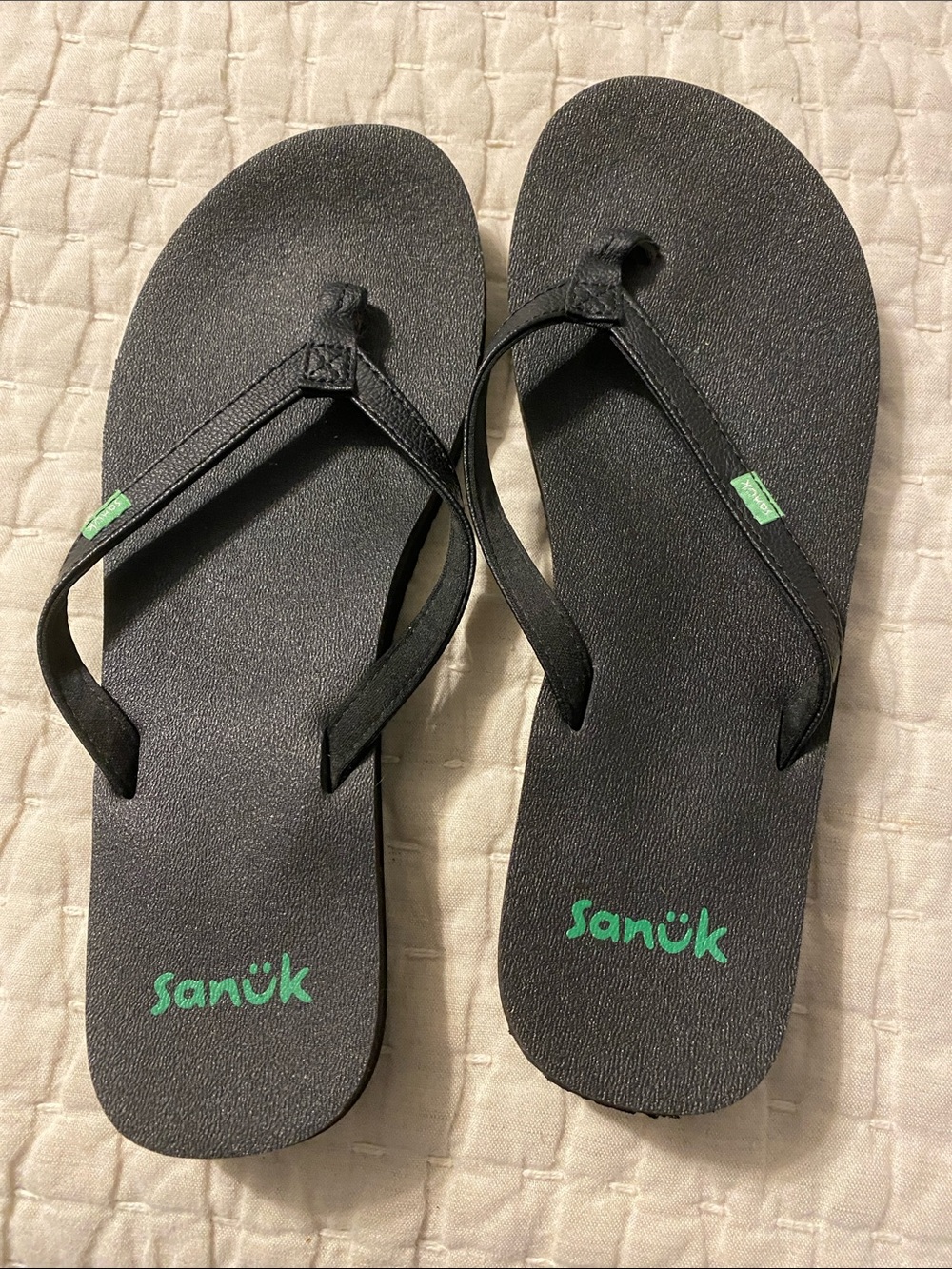 Sanuk Black Flip Flops with Green Logo Accents